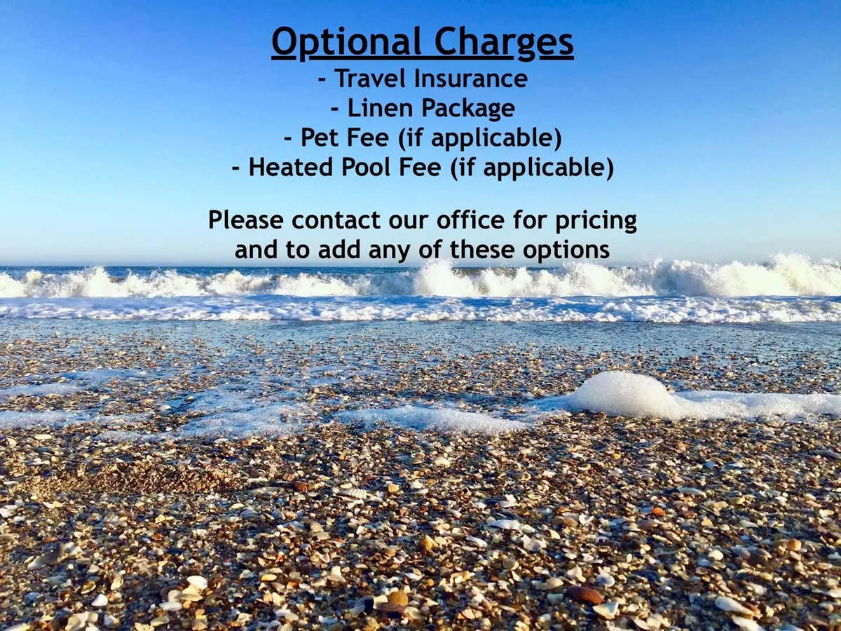 A tranquil stretch of sandy shoreline bordered by gentle waves, with soft morning light highlighting the beach's pet-friendly atmosphere. The scene invites early morning strolls and showcases the open, welcoming nature of North Topsail Beach.